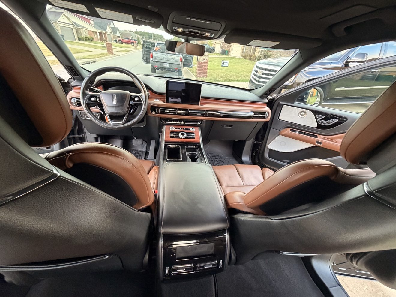 Clean dashboard and front cabin inside a Lincoln Aviator